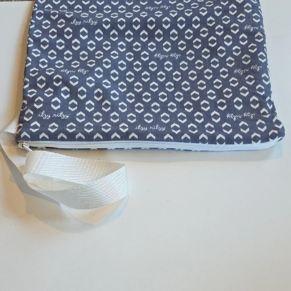 Itzy Ritzy Travel Happens Wet Bag -  Blue and White Patterned Zipper Bag